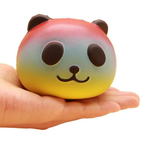 squishy panda head rainbow in the hand